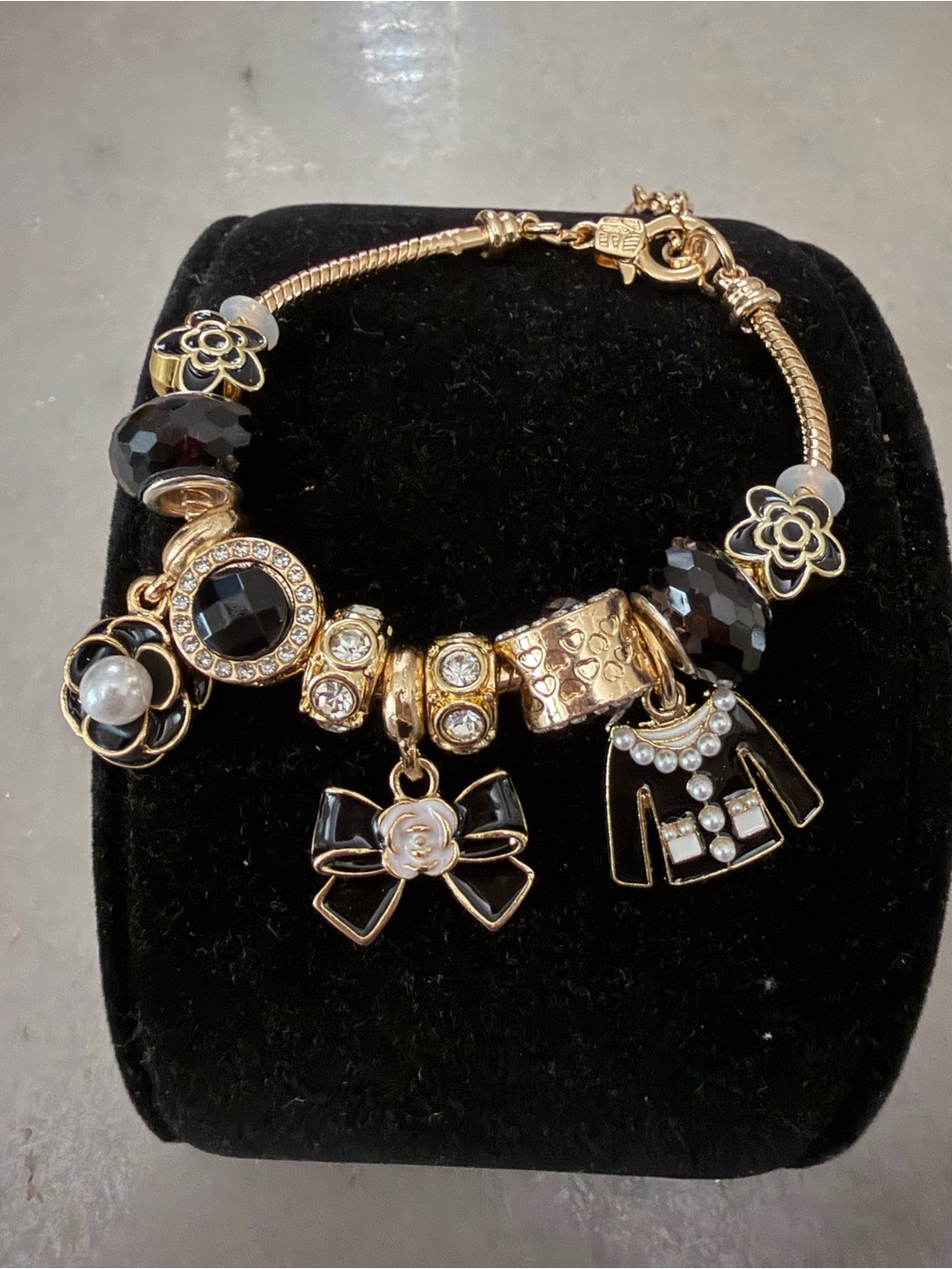 Gold-Tone Black & Pearl Bracelet with Cz accent’s